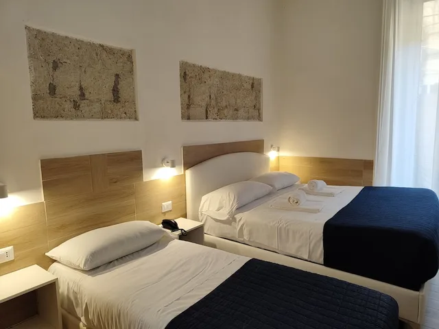 غرفة قياسية ثلاثية بسرير مزدوج وسرير فردي، Ideal City Walk 1/7