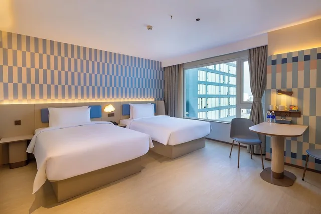 غرفة بزنس بسريرين منفصلين، Sunland Hotel 7/10