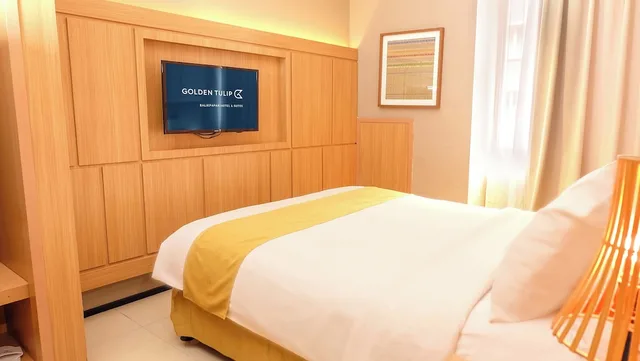 جناح جونيور بسرير كوين وسرير فردي، Golden Tulip Balikpapan Hotel and Suites 1/3