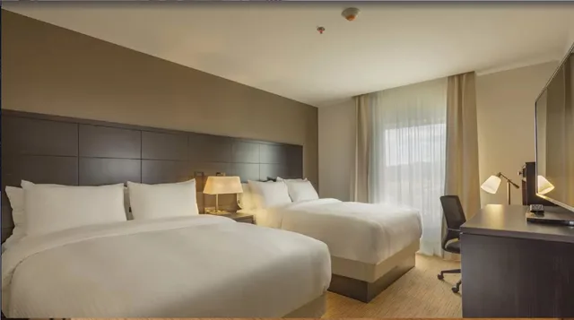 جناح بسرير كينج وسريرين كوين بغرفتي نوم، Staybridge Suites Silao 1/3