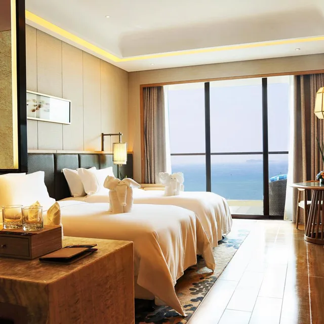 غرفة تنفيذية بسرير كينج بإطلالة على البحر، HARMAN HOTEL SANYA 4/6
