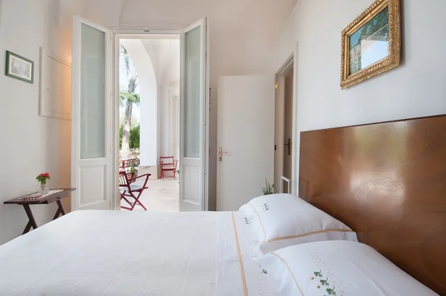 جناح عائلي بسرير كوين وسرير فردي بإطلالة على الحديقة، Agriturismo Villa Coluccia 1/1