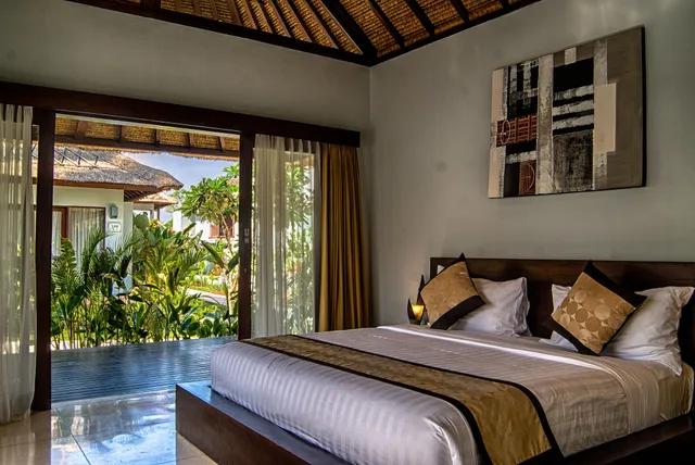 غرفة بسرير كينج بإطلالة على الحديقة، Living Asia Resort Spa Lombok 1/5
