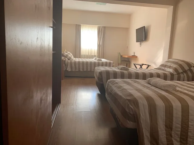 غرفة سوبيريور رباعية بسرير كينج وسريرين منفصلين، Nativo Boutique Hotel 1/10