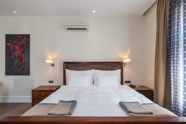 غرفة ديلوكس بسرير كينج مع أريكة، Misafir Suites 8 Istanbul. 1/10