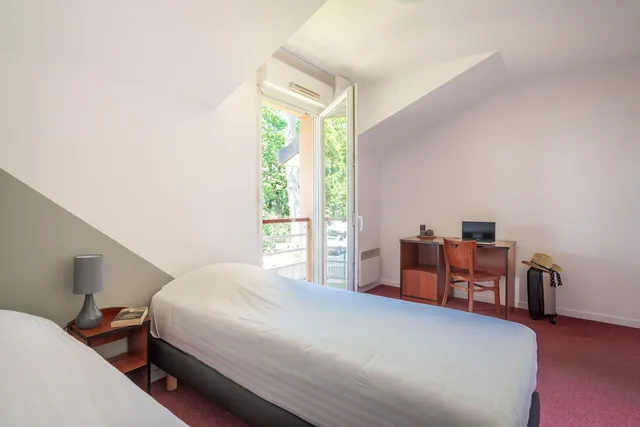 شقة بسريرين مزدوجين بغرفتين مع أريكة، Comfort Aparthotel Nantes La Beaujoire 2/5