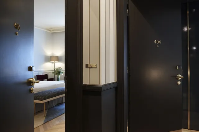 جناح متصل جونيور تنفيذي بسريرين كينج، Powers Hotel 6/6