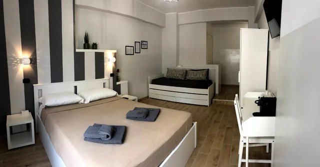 غرفة فاخرة ثلاثية بسرير كوين وسرير فردي بإطلالة على المدينة، Avec Moi Roma 1/1