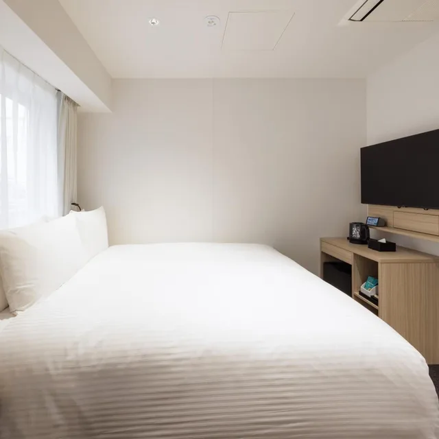 غرفة بسرير كينج وسرير كوين، Toranomonholic Hotel 2/5
