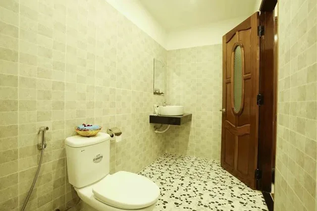 غرفة ديلوكس بسريرين منفصلين، Coconut Garden Homestay Hoi An 1/2