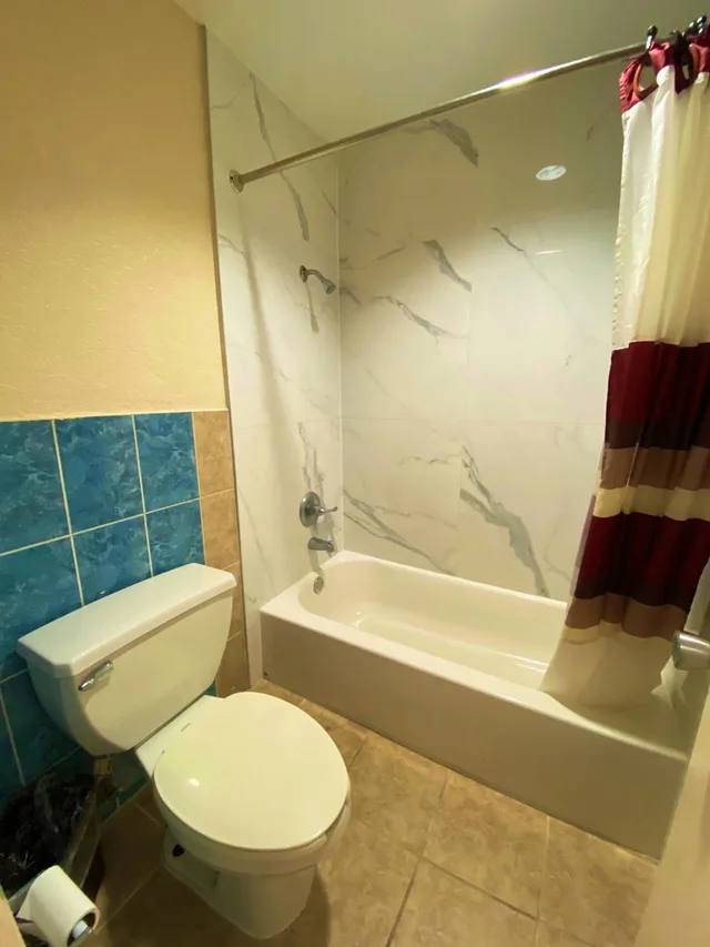 غرفة بسرير كينج وسرير كوين للمدخنين لذوي الإعاقة، Economy Lodge by Hotel O Texas City 6/8