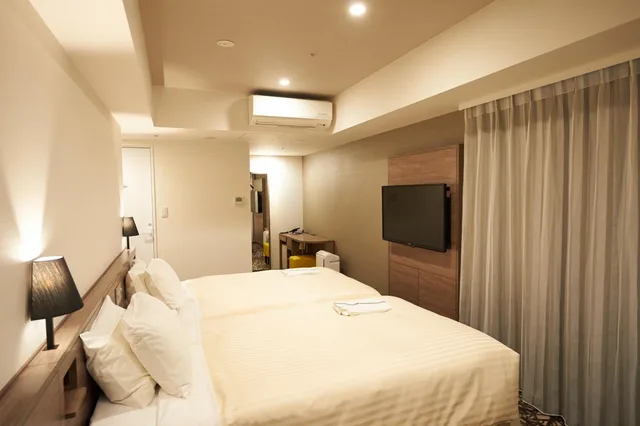 غرفة بريميوم ثلاثية بسريرين منفصلين مع أريكة للمدخنين، SOTETSU FRESA INN GINZA-NANACHOME 1/5