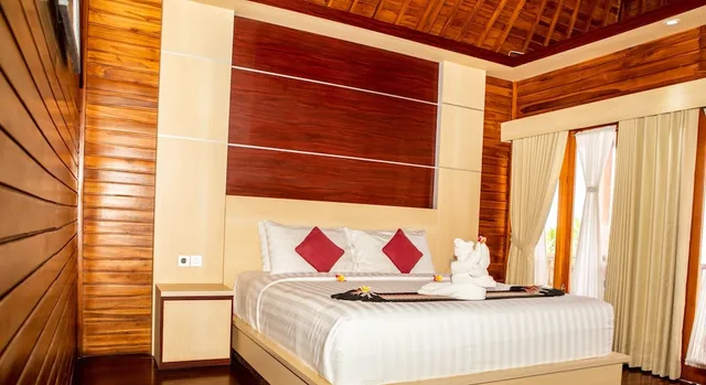 كوخ ديلوكس بسرير كينج بإطلالة على المسبح، Sunrise Cottage Nusa Penida 1/7
