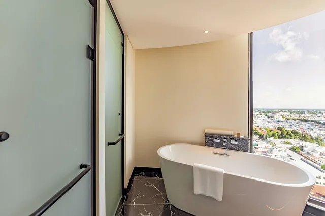 غرفة بريميير ديلوكس بسريرين منفصلين، Charmant Suites a Boutique Hotel Can Tho 4/4