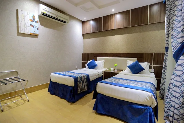 غرفة جونيور بسريرين كينج بغرفتي نوم، تايم المروج للشقق الفندقية(TIME Al Muruj Hotel Apartments) 3/6