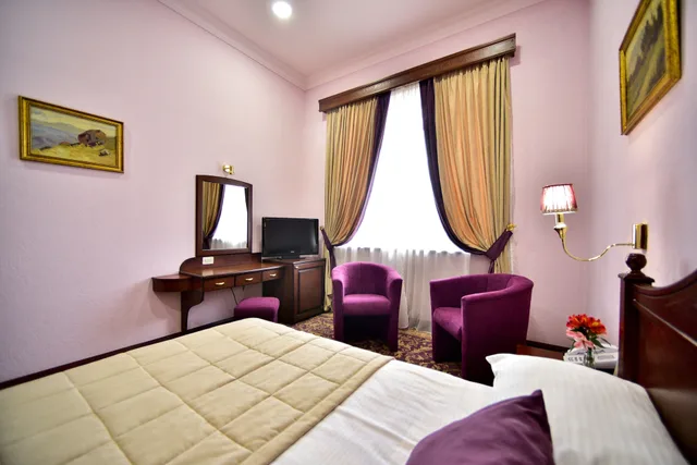 غرفة قياسية بسرير كوين، METROPOL HOTEL 2/8