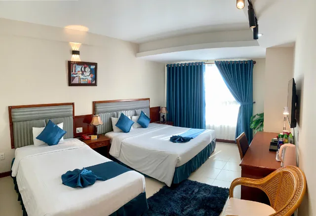 غرفة ديلوكس ثلاثية بسرير مزدوج وسرير فردي بإطلالة على البحر، The Coast Hotel 2/2