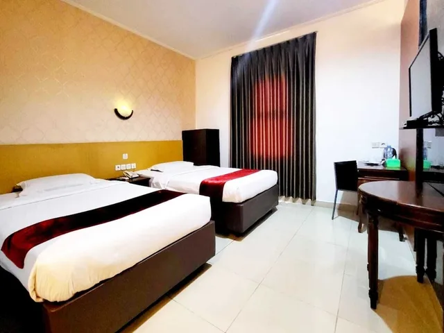 غرفة ديلوكس بسريرين منفصلين، Hotel Marilyn Serpong - Tangerang Selatan 1/3