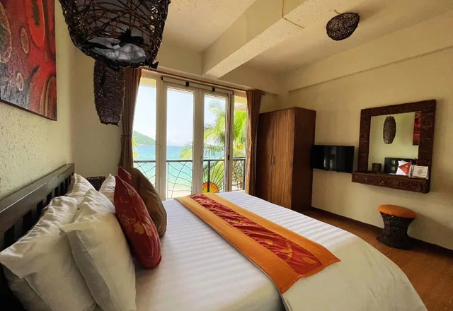 جناح شهر العسل بسرير كينج، Sunset At Aninuan Beach Resort 2/2