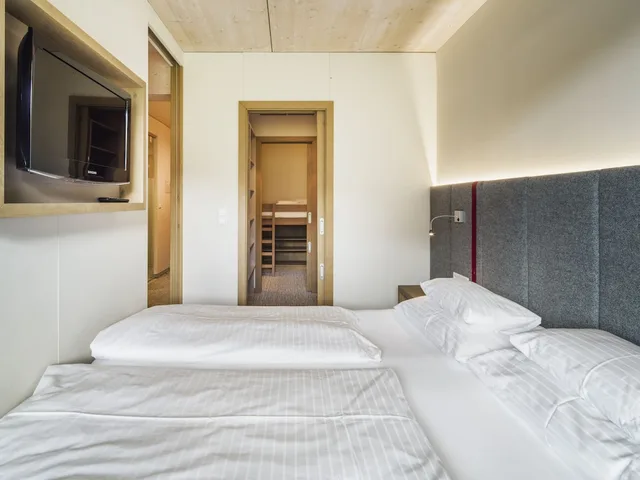 غرفة كومفورت عائلية بسرير كينج وأسرّة بطابقين بشرفة، Falkensteiner Hotel Sonnenalpe 4/10