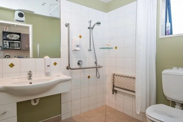 جناح تنفيذي بسرير كينج مع دخول الصالة، Gladstone Motel Nelson 4/5