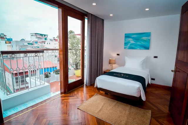 جناح عائلي بسرير كينج وسرير فردي بإطلالة على المدينة بشرفة بغرفتي نوم، Haibay Hotel 3/10