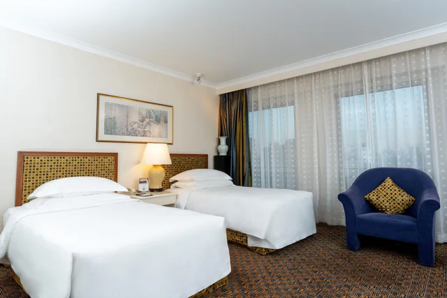 غرفة تنفيذية بسرير كوين وسريرين منفصلين، Grand Skylight Hotel Royal 2/6