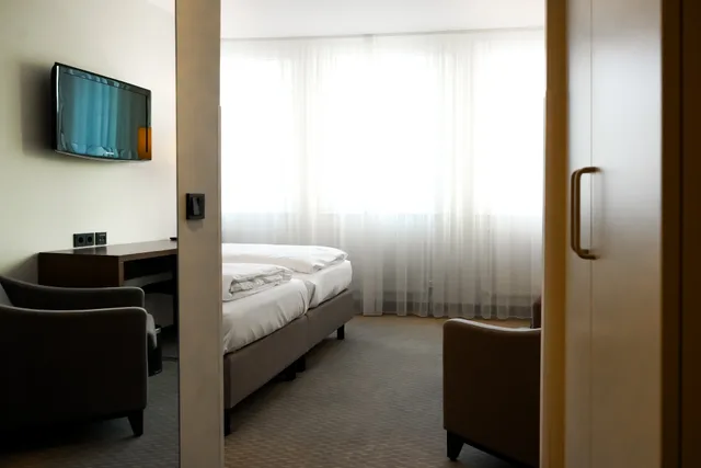 غرفة قياسية بسرير مزدوج أو سريرين منفصلين، Sylter Hof Hotel 4/8