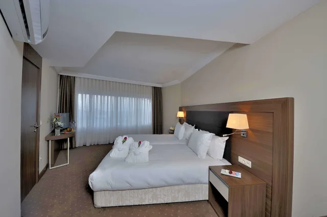 Duplex, Family, King Bed, Mosque View, Sofa، Kenzi Basma Hotel 3/9
