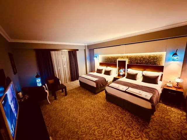 غرفة ديلوكس رباعية بغرفة نوم واحدة، White Heaven Hotel 2/2