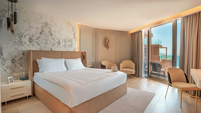 غرفة ديلوكس بسرير كوين بإطلالة على البحر بشرفة، Qlusive Hotel 2/5