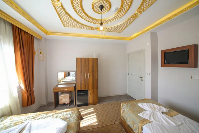 غرفة عائلية ثلاثية بسرير كوين وسرير فردي بإطلالة على البحر، Delbab Hotel 2/5