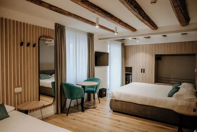 غرفة جونيور بسرير كينج وسرير فردي، Hotel Garni Venezia 1/10