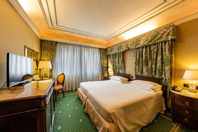غرفة قياسية بسرير كوين، River Chateau Hotel 3/6