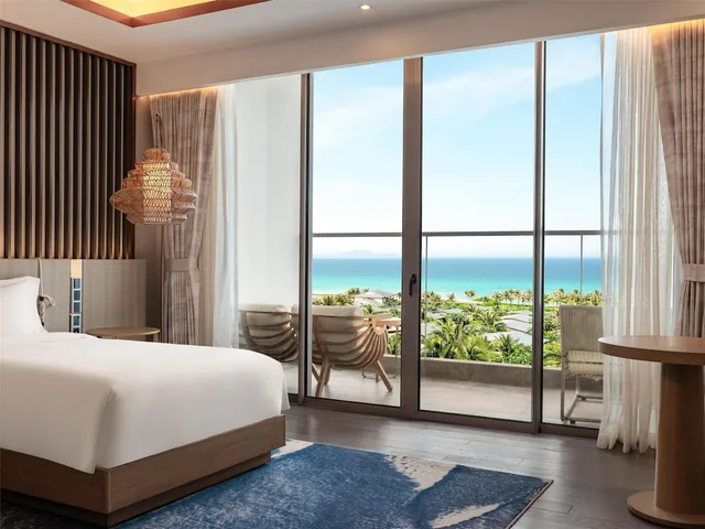 غرفة متصلة عائلية بسرير كينج وسريرين منفصلين بإطلالة على البحر، Radisson Blu Resort Cam Ranh 2/4