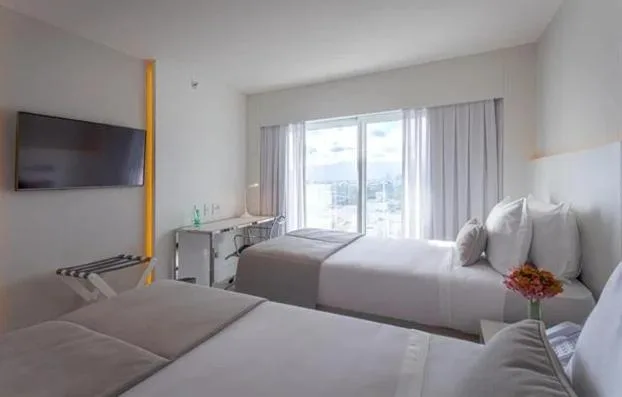 غرفة فاخرة ثلاثية بسرير مزدوج وسرير فردي، Cdesign Hotel 3/7