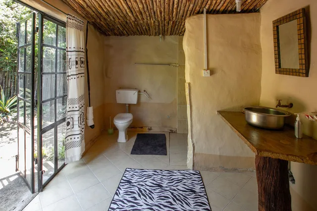 كوخ بسرير كوين بحمام خاص، Punda Milias Camp Nakuru 1/1