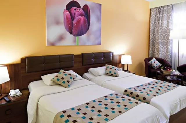 غرفة بريميوم ثلاثية بسرير مزدوج وسرير فردي، Three Corners Rihana Resort 1/5
