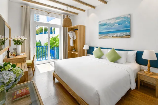 غرفة ديلوكس بسرير كينج بإطلالة على المدينة، Risemount Premier Resort Danang 1/2