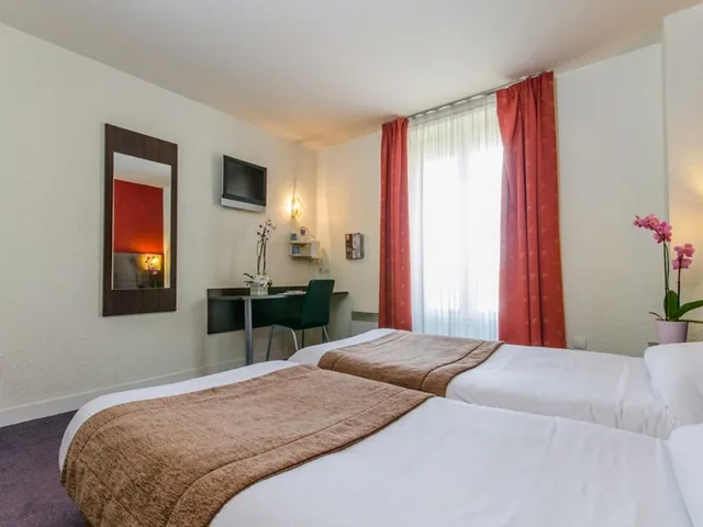غرفة بسريرين منفصلين، Hotel Arc Paris Porte D Orleans Formerly Kyriad Paris Sud Porte D Orl Ans 1/10