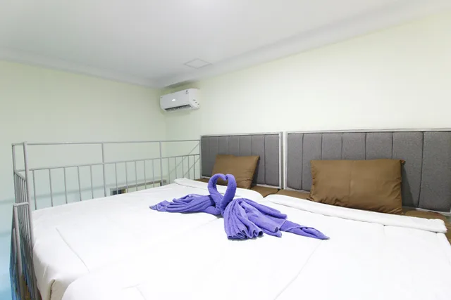 جناح تنفيذي بإطلالة على الحديقة بشرفة، Urbanest Inn House Slipi 1/2