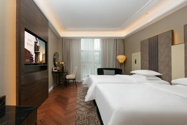 Elegant, Twin Beds، Metropolo Zhenjiang Railway Station Wanda Square 1/7