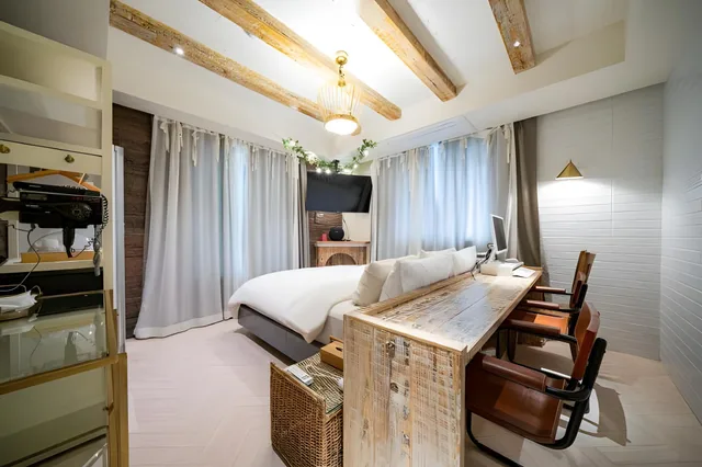 جناح بسريرين مزدوجين بإطلالة جزئية على البحر، SongJeong Lesign Hotel 2/2
