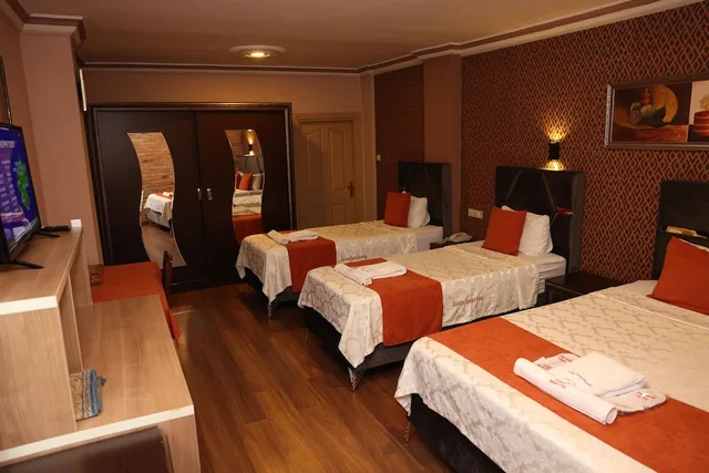غرفة عائلية بسرير مزدوج وسرير فردي، Adana Saraya Hotel 1/5