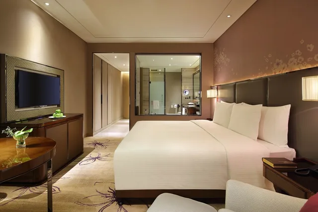 غرفة تنفيذية بسرير كينج، Wanda Realm Guangyuan 6/7