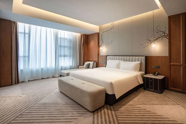جناح حصري بسرير كينج مع أريكة، Howard Johnson by Wyndham Jufu Plaza Jinxi 1/1