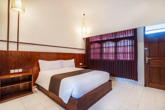 غرفة قياسية بسرير كوين، Suka Beach Inn 1/4