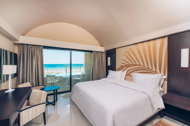 جناح جونيور بسرير كينج بإطلالة على البحر مع أريكة، Iberostar Selection Kuriat Palace 1/2
