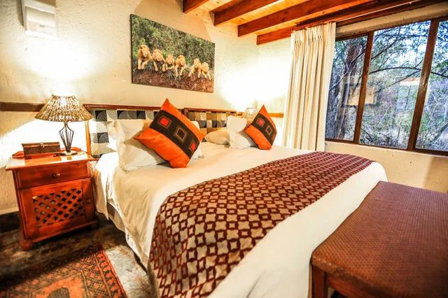 شاليه عائلي بسريرين منفصلين بإطلالة على الحديقة بغرفتي نوم، Grand Kruger Lodge And Spa 1/6