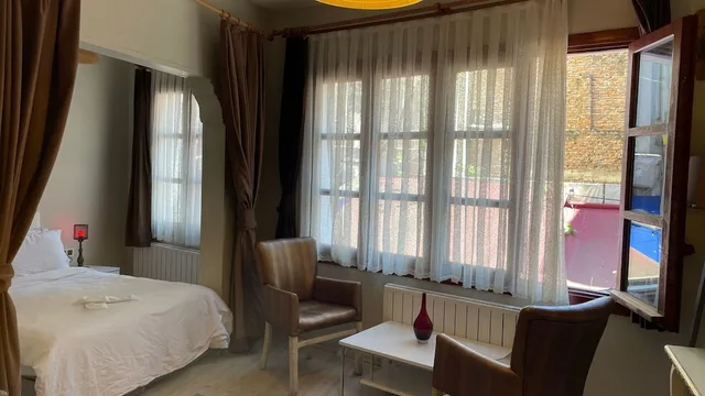 Family, Quadruple, 1 Queen and 2 Bunk Beds, Sofa, Chez Bore Boutique Hotel 2/10